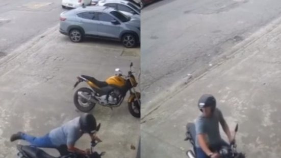 As imagens de monitoramento do local registraram momento em que o ladrão se aproxima da moto - Imagem: Reprodução/ Guarujá Mil Grau